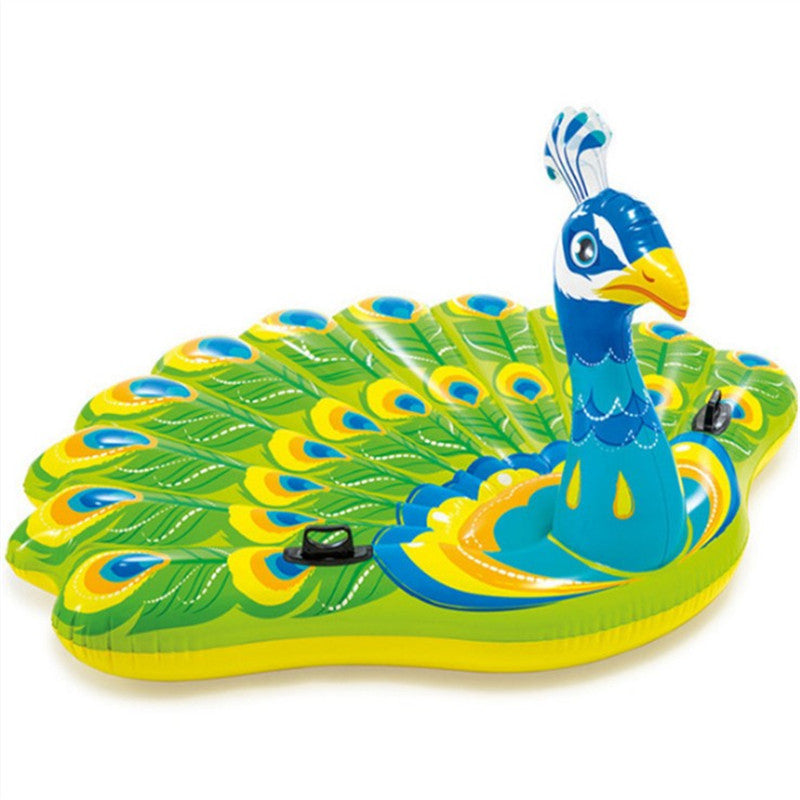 A Peacock Floats An Inflatable Toy On The Water