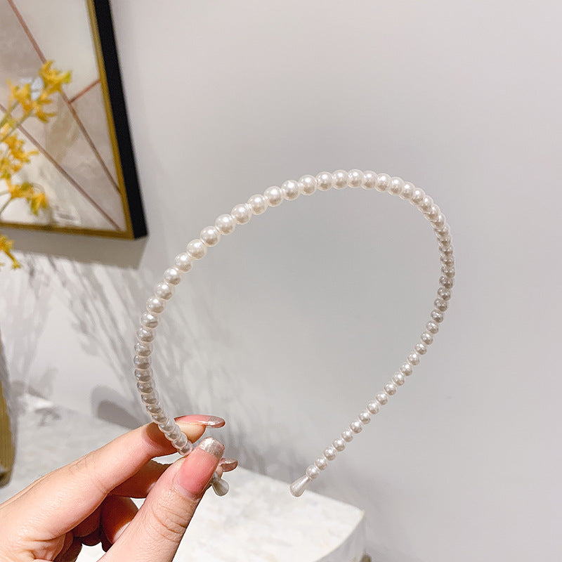 Thin pearl headband