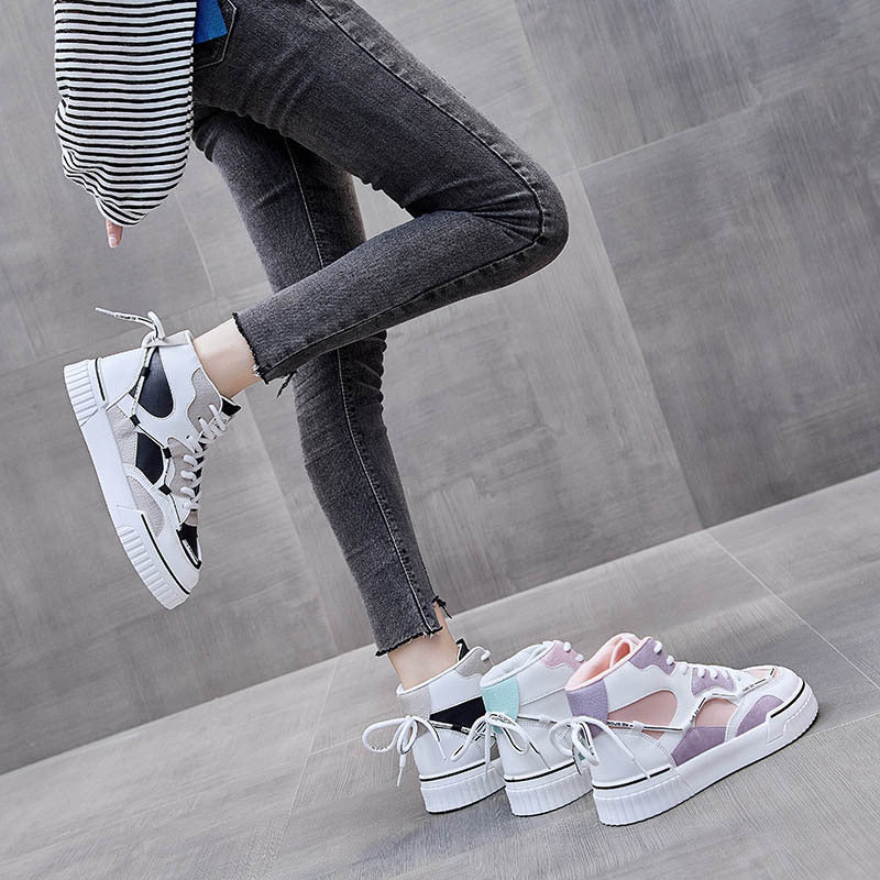 This is a Women  High Top White Shoes